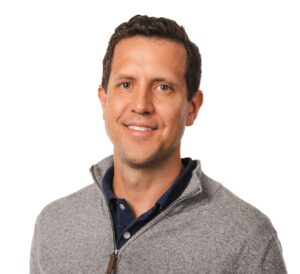 headshot photo of OKAlone Senior Vice President Rob Camp