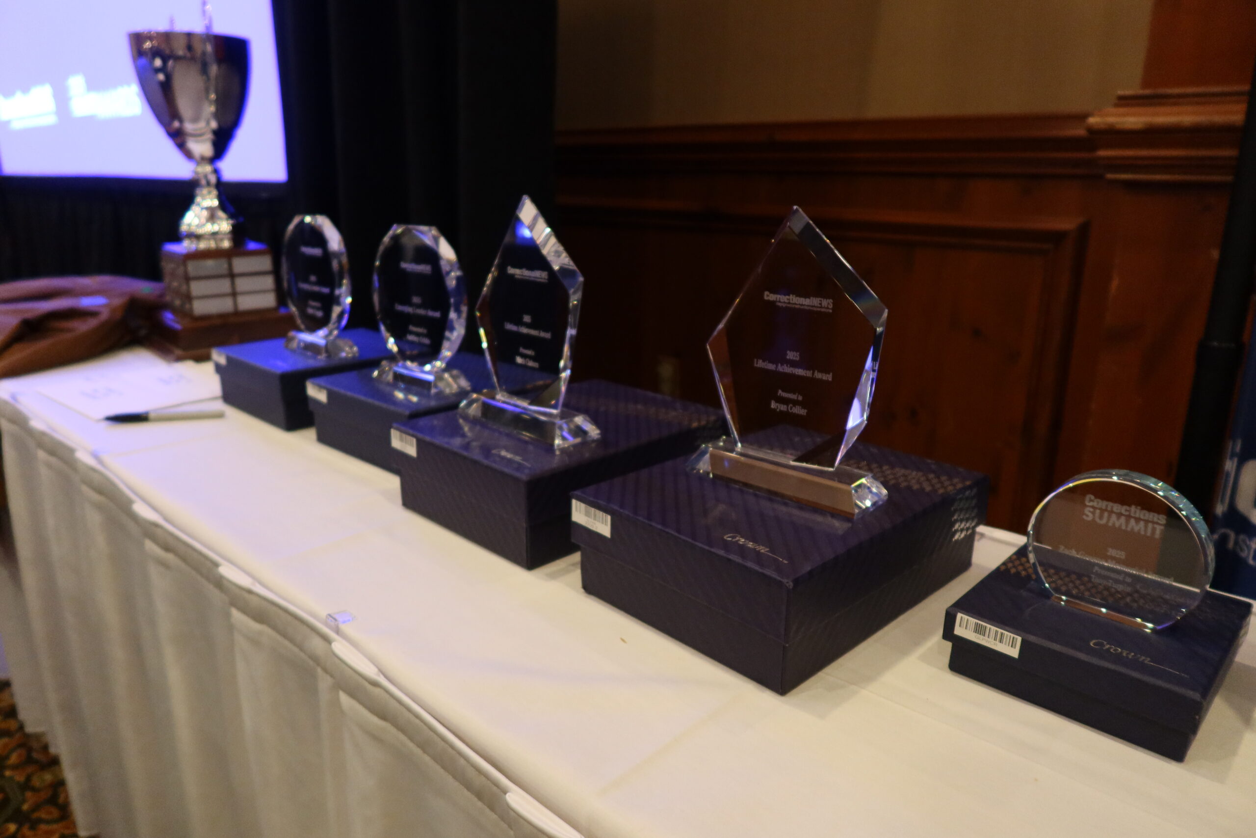 awards plaques lined up on a table