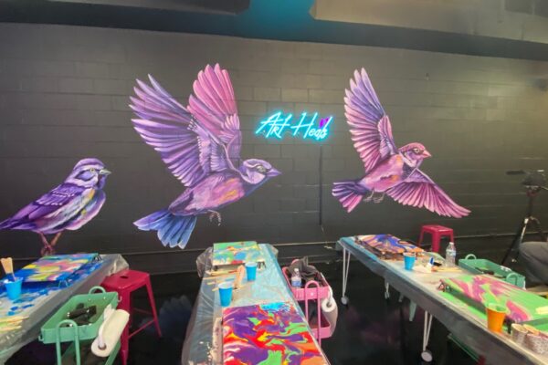 art studio with murals on the wall