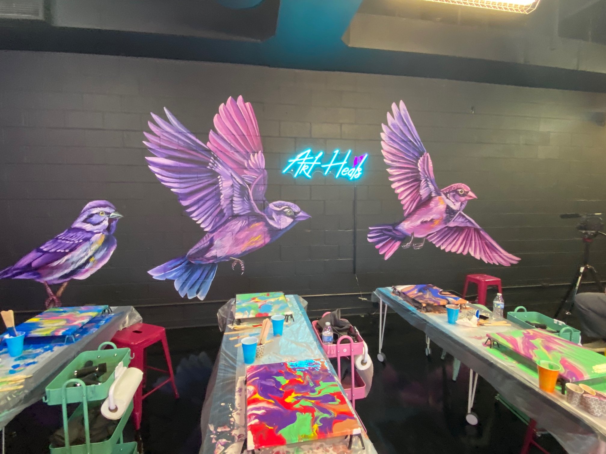 art studio with murals on the wall