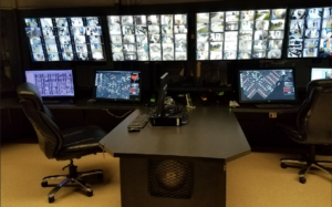 control room with security electronics inside prison