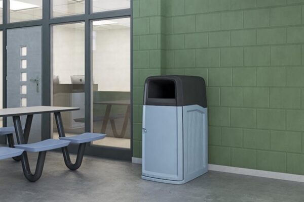 gray trash bin in prison day room
