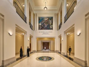 lobby of courthouse building with historic mural on wall