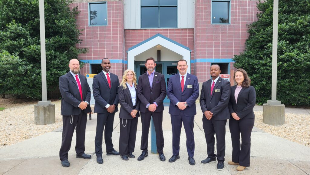 Director William K. Marshall III and Federal Bureau of Prisons employees
