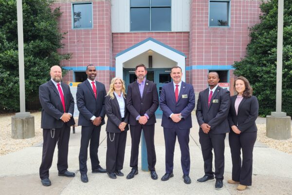 Director William K. Marshall III and Federal Bureau of Prisons employees