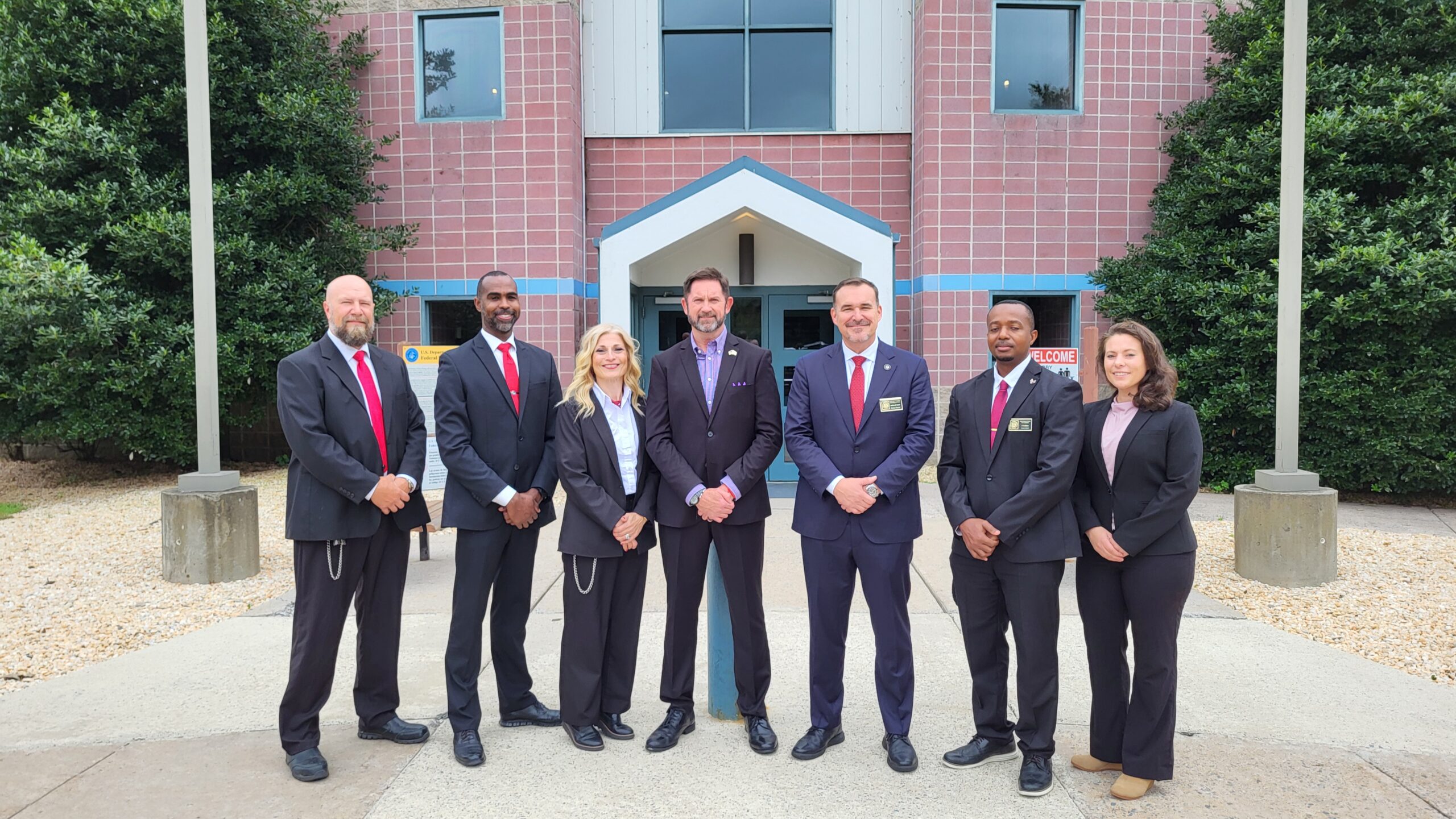 Director William K. Marshall III and Federal Bureau of Prisons employees