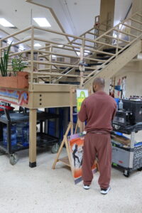 inmate painting in Little Scandinavia unit