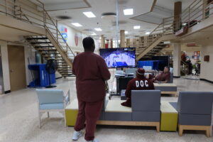 inmates watching television in Little Scandinavia unit