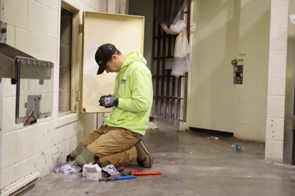 maintenance worker fixing water systems at Montana State Prison