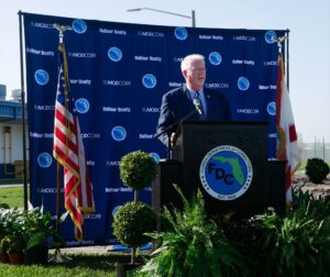 Florida DOC Secretary Richard Comerford speaking at podium
