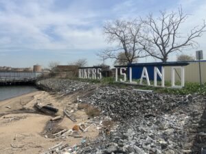 exterior shot of Rikers Island jail sign