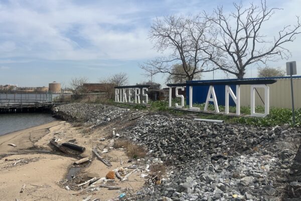 exterior shot of Rikers Island jail sign