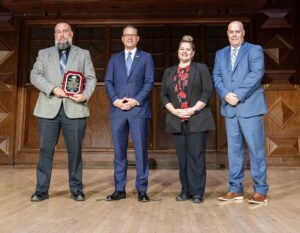Tim Schweinsburg, Gov. Josh Shapiro, Dr. Laurel Harry and Reed Davy at an awards ceremony