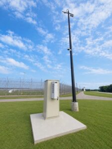 PROscan device next to utility tower