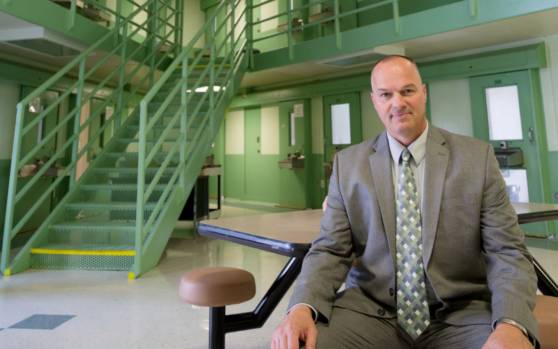 Randall Liberty seated inside prison